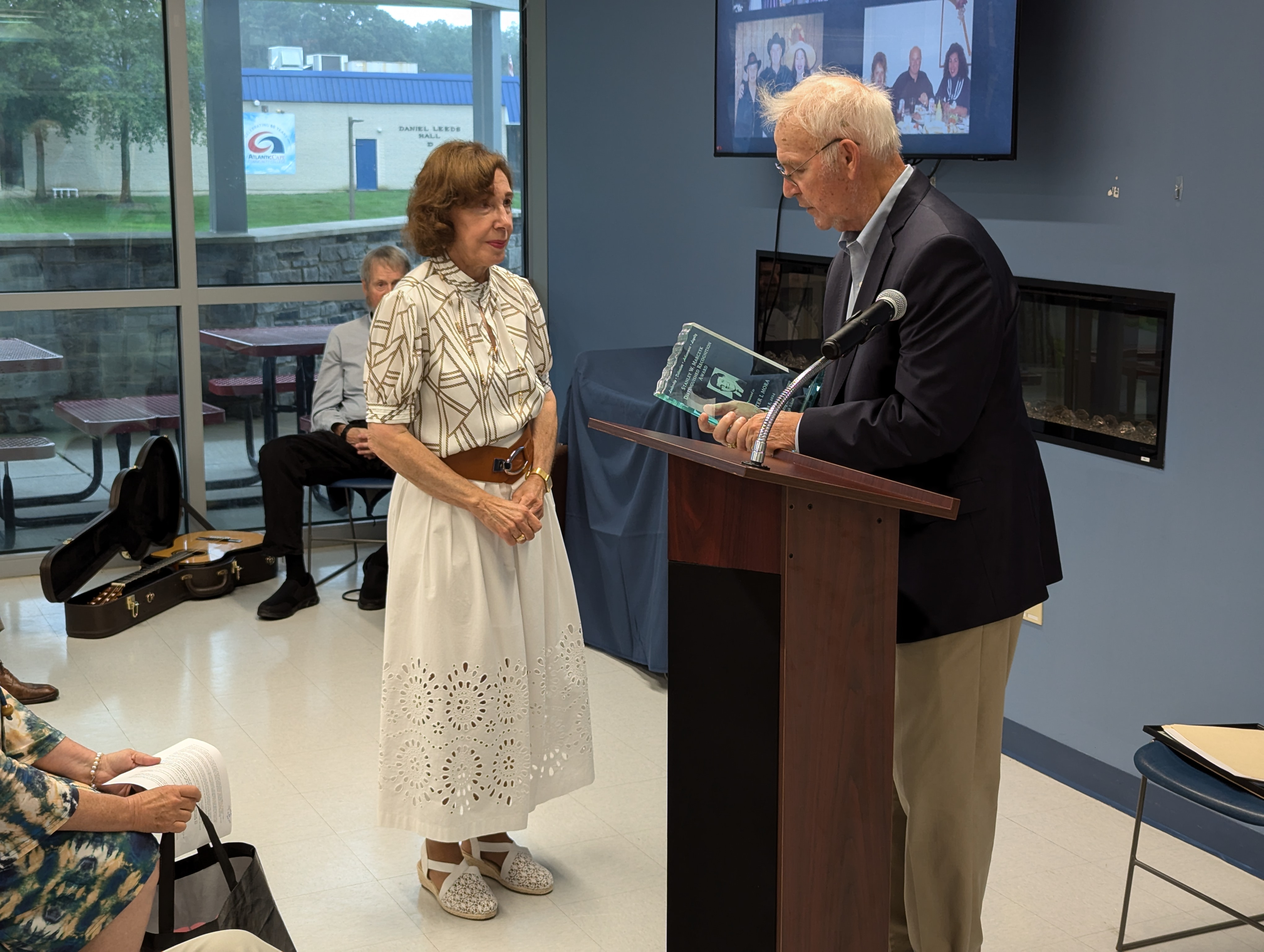 Dr DeFranco accepts award on her late husband's behalf