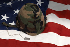 American flag and soldier's helmet