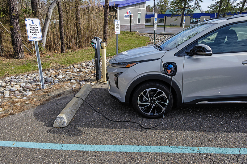 Electric car being charged at an electric charging station in Atlantic Cape's parking lot.