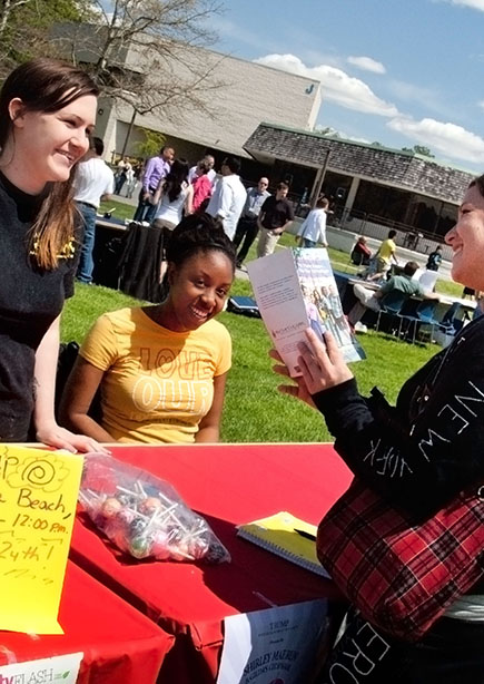 Students at booth on campus