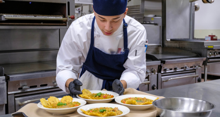 ACA student Julio Gomez IV during cooking competition