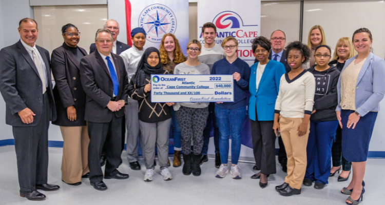 Representatives from OceanFirst Foundation present check to Atlantic Cape