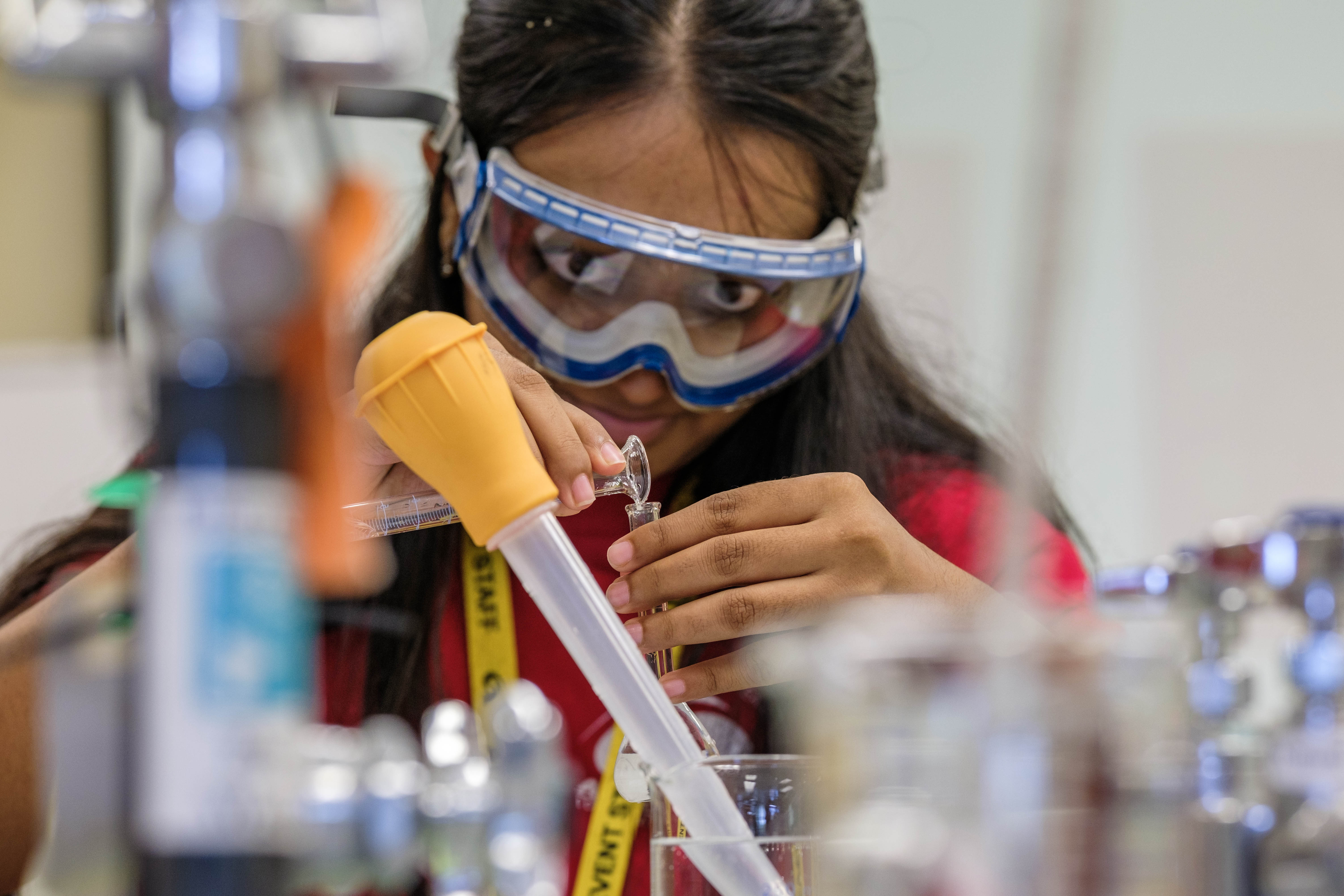 student in science lab session during orientation