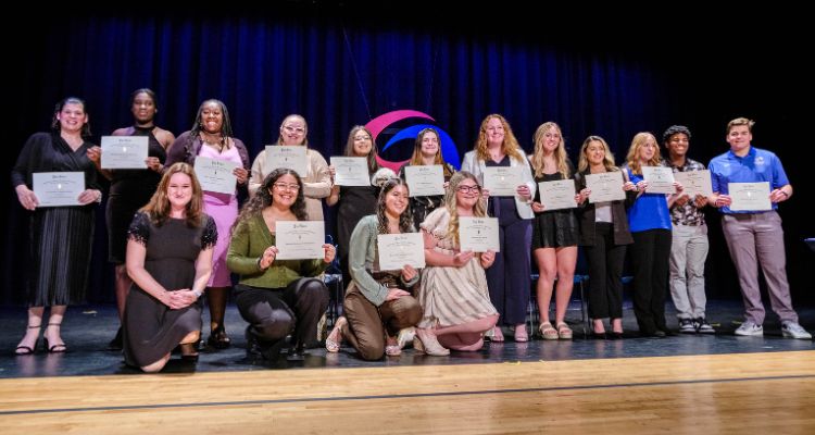 Psi Beta Psychology Honor Society members pose for a photo after the induction ceremony