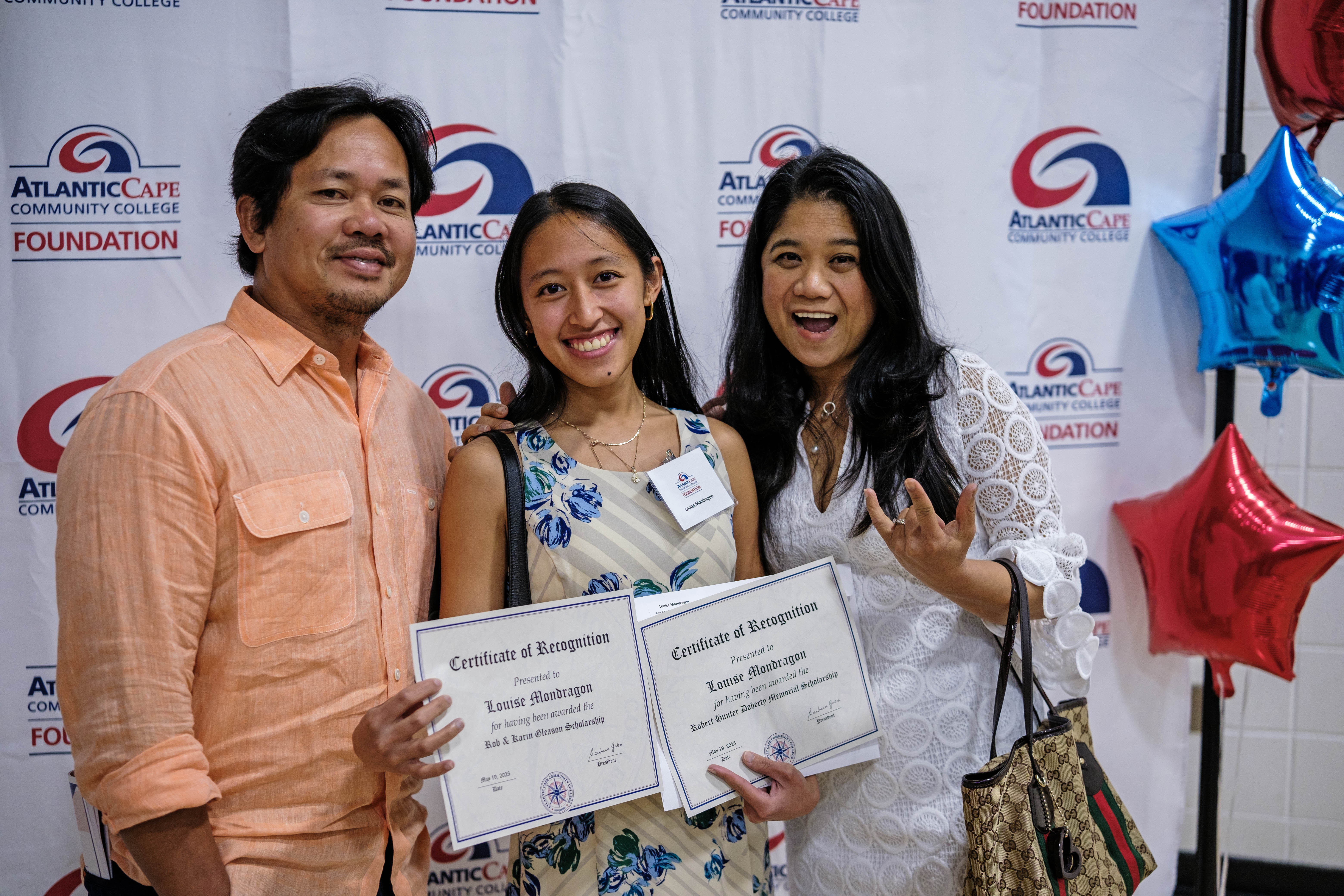 Scholarship recipient with family