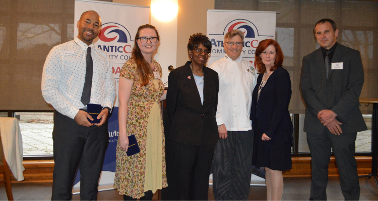 Atlantic Cape President Dr. Barbara Gaba, center, poses for a photo with the 2022 Distinguished Alumni winners, from left, Jerome Ingram, Taylor Henry, William McCarrick, Terry Budd and Greg Lasher. The winners were honored at an Awards Dinner on Wednesday, April 13, 2022 at Careme's.