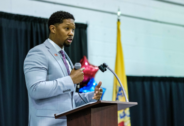 Athletic Director Jamal Edwards speaks to the audience at the 2nd Annual Athletics Banquet