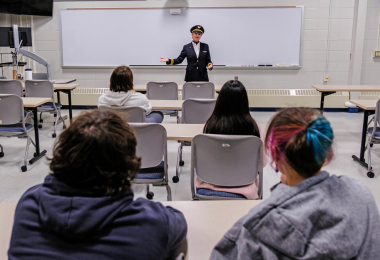 United Airlines Boeing 777 Pilot Cheryl Lynn Simpson speaks to the students about the life of a pilot