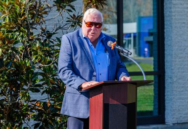 Dennis Huey speaks at Dr. Kaplan's bench dedication ceremony