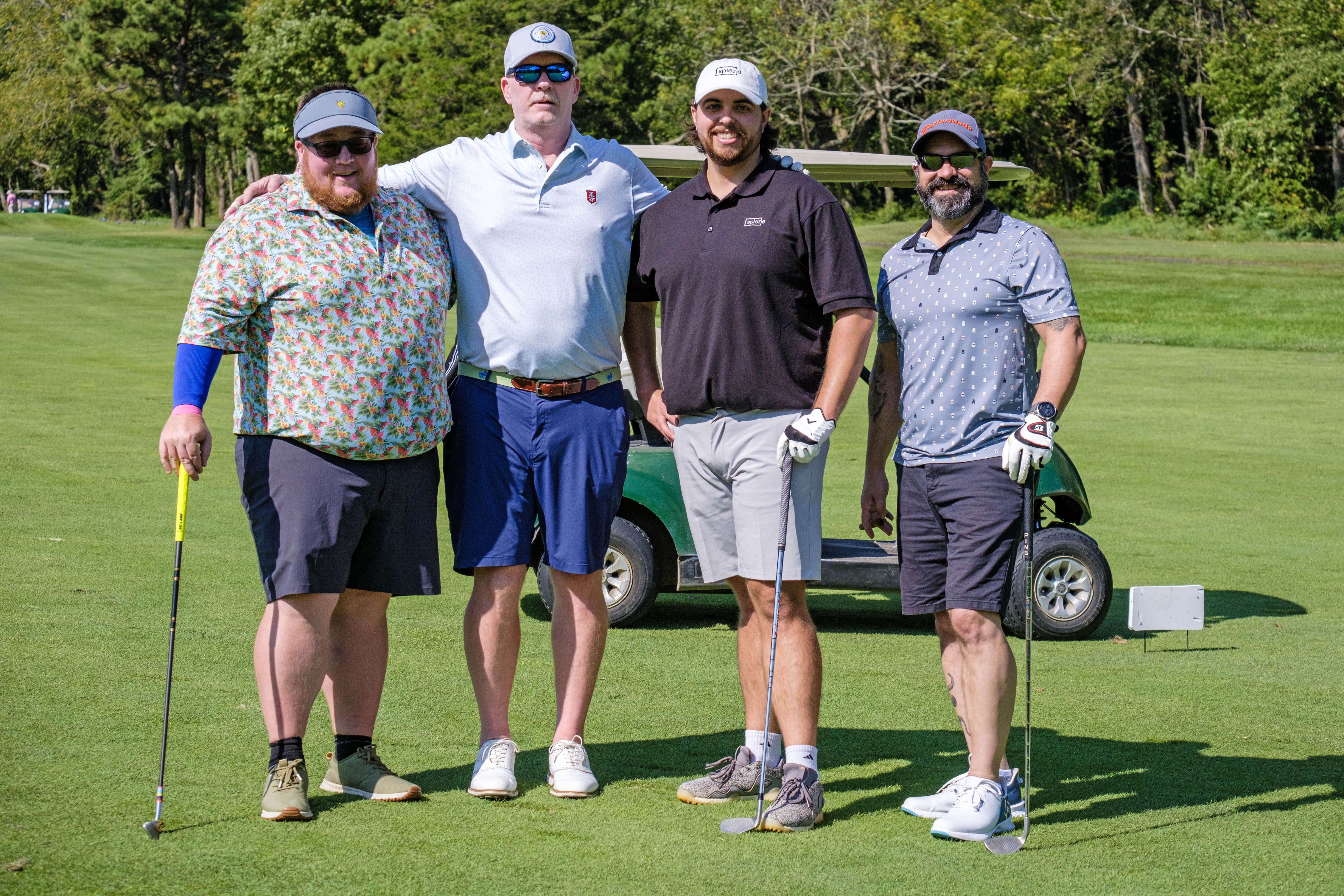 Golf team foursome at annual golf tournament