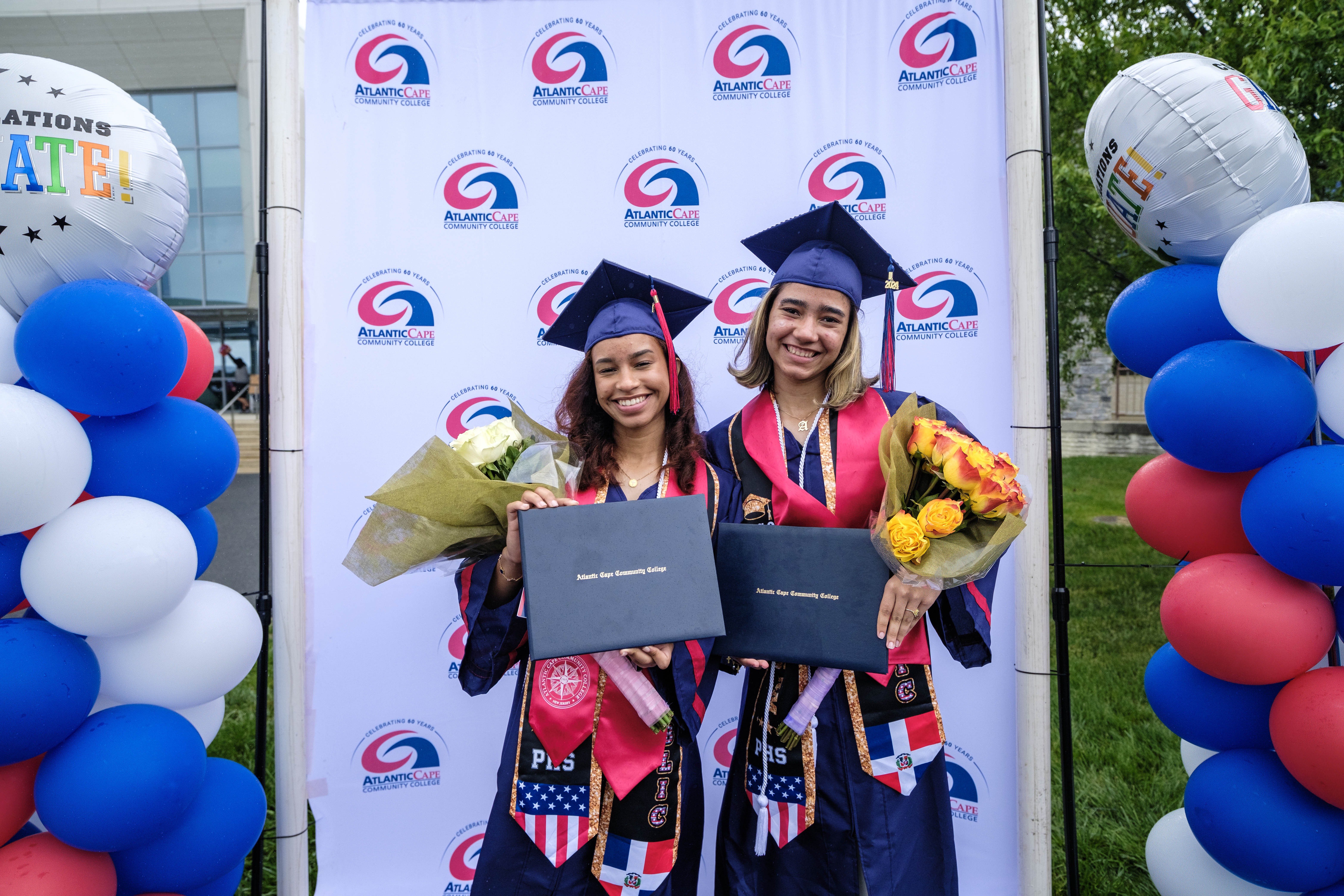 Graduates pose after the ceremony