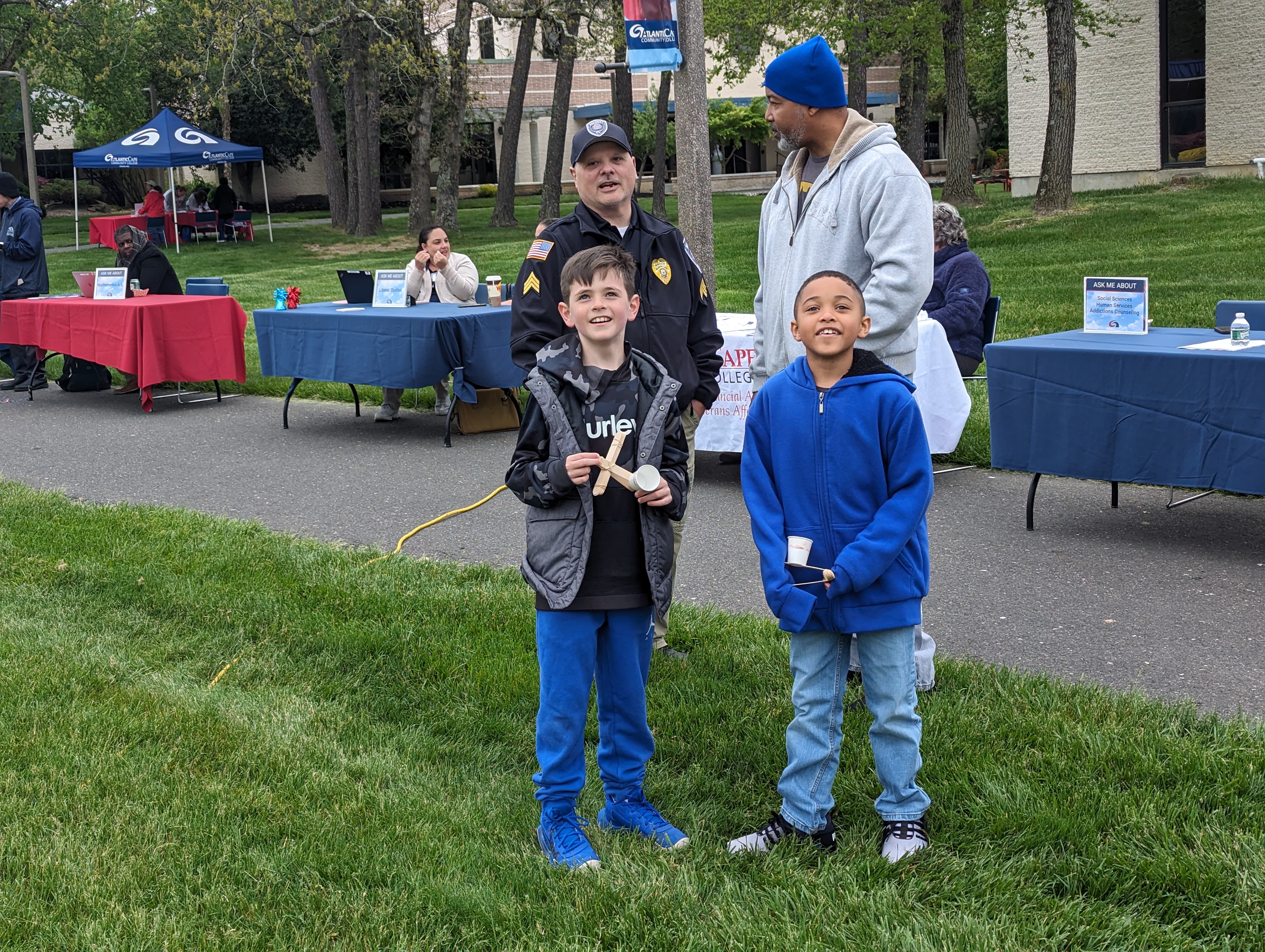 Youngsters enjoy a demonstration at the 60th anniversary Party in the Quad