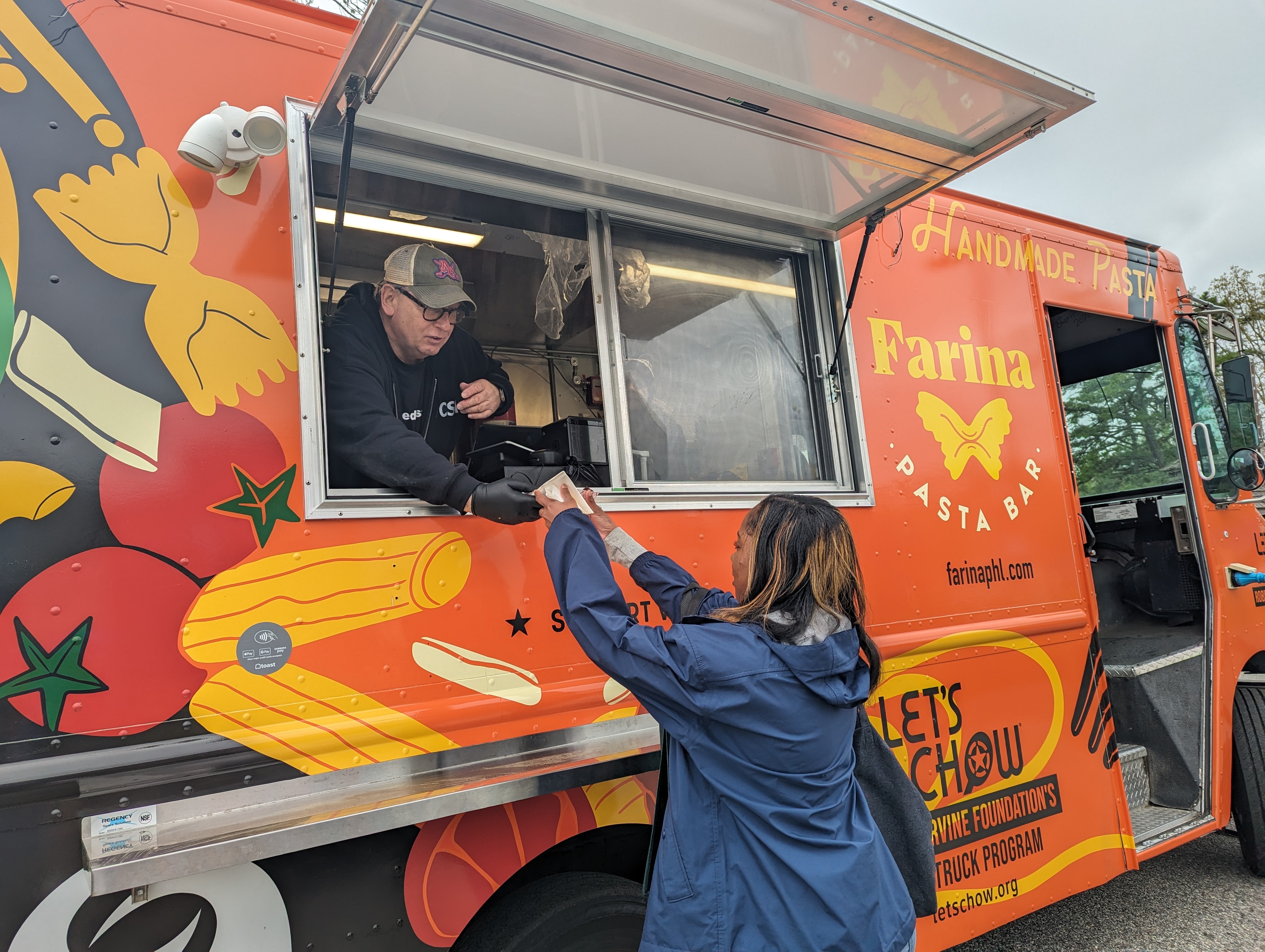 Enjoying food from the Academy of Culinary Arts Food Truck