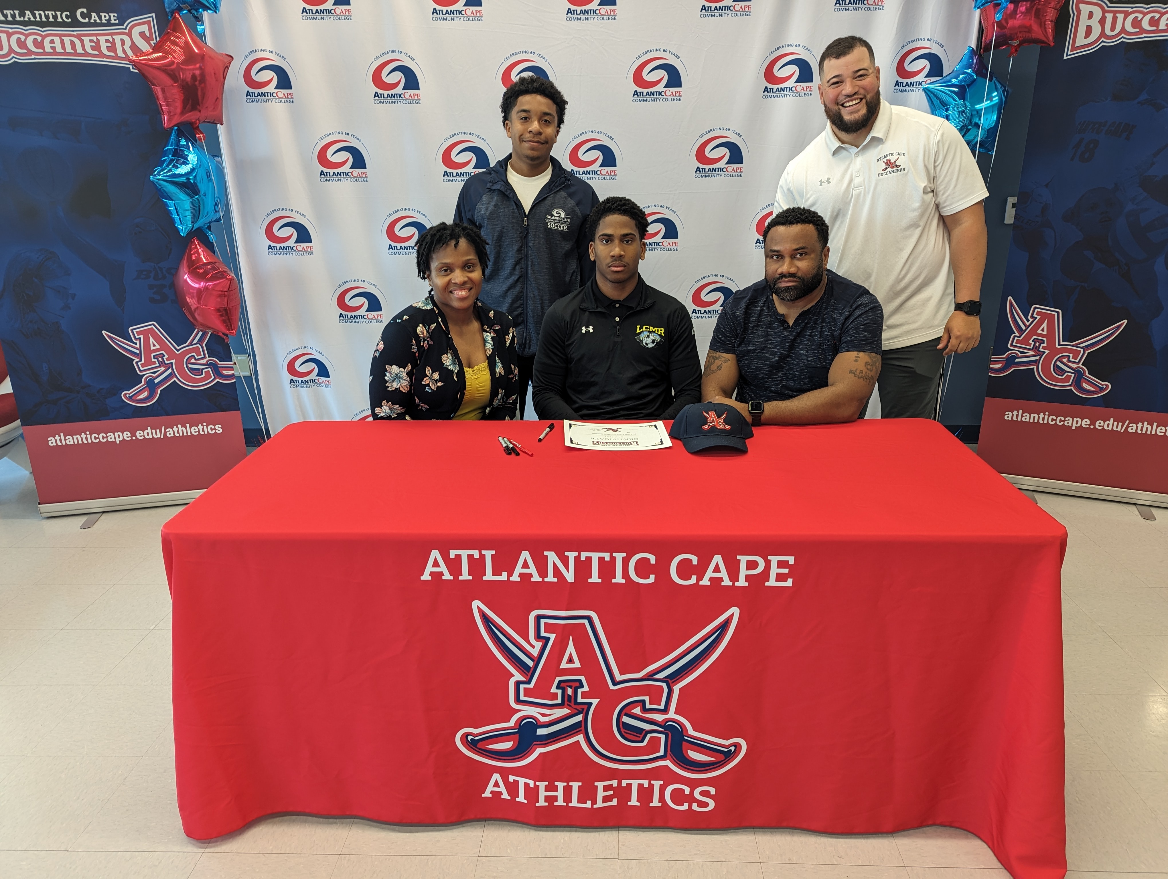 Deron Azille and his family at Athletics Signing Day