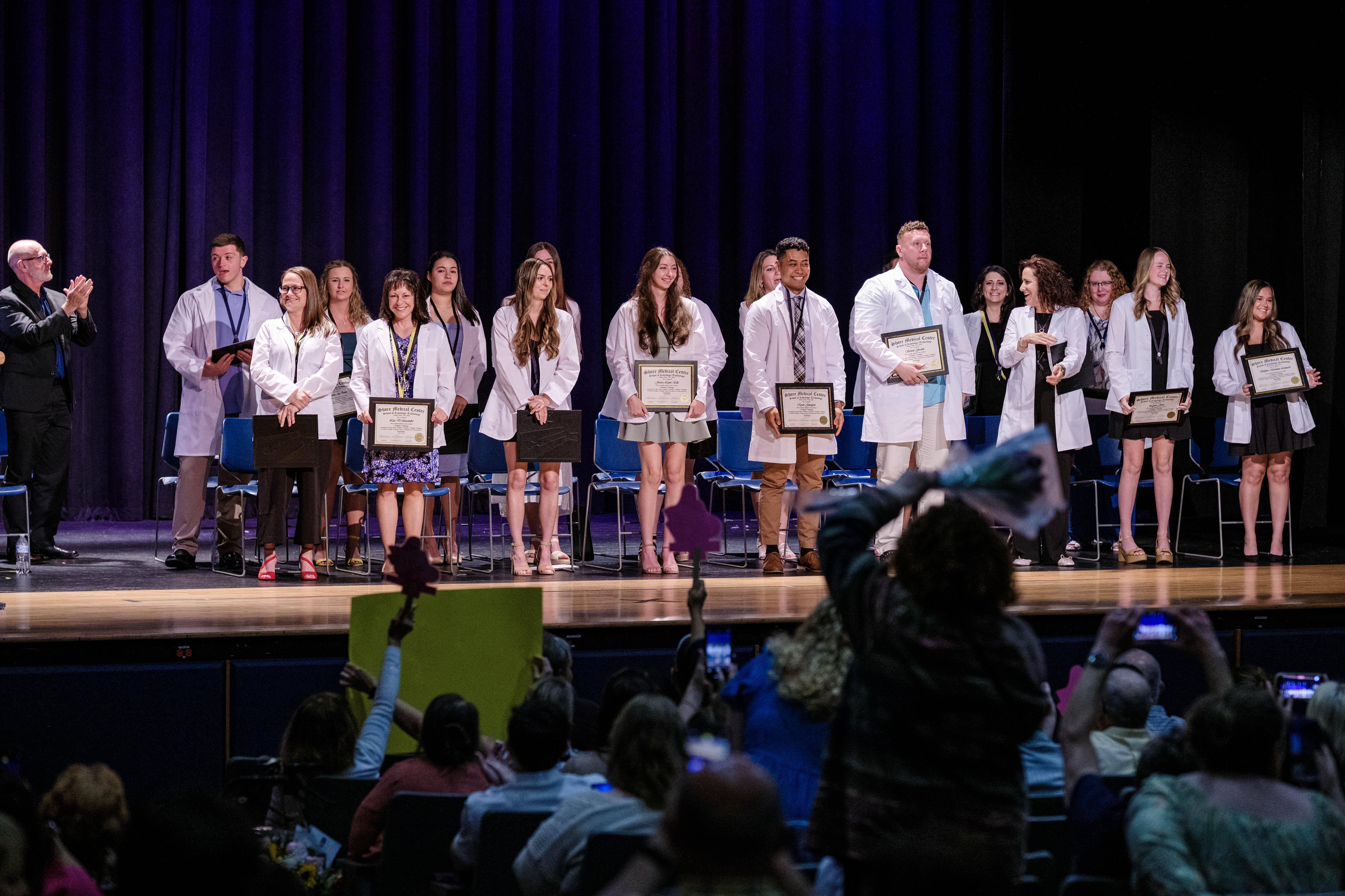 Radiologic Tech graduates on stage