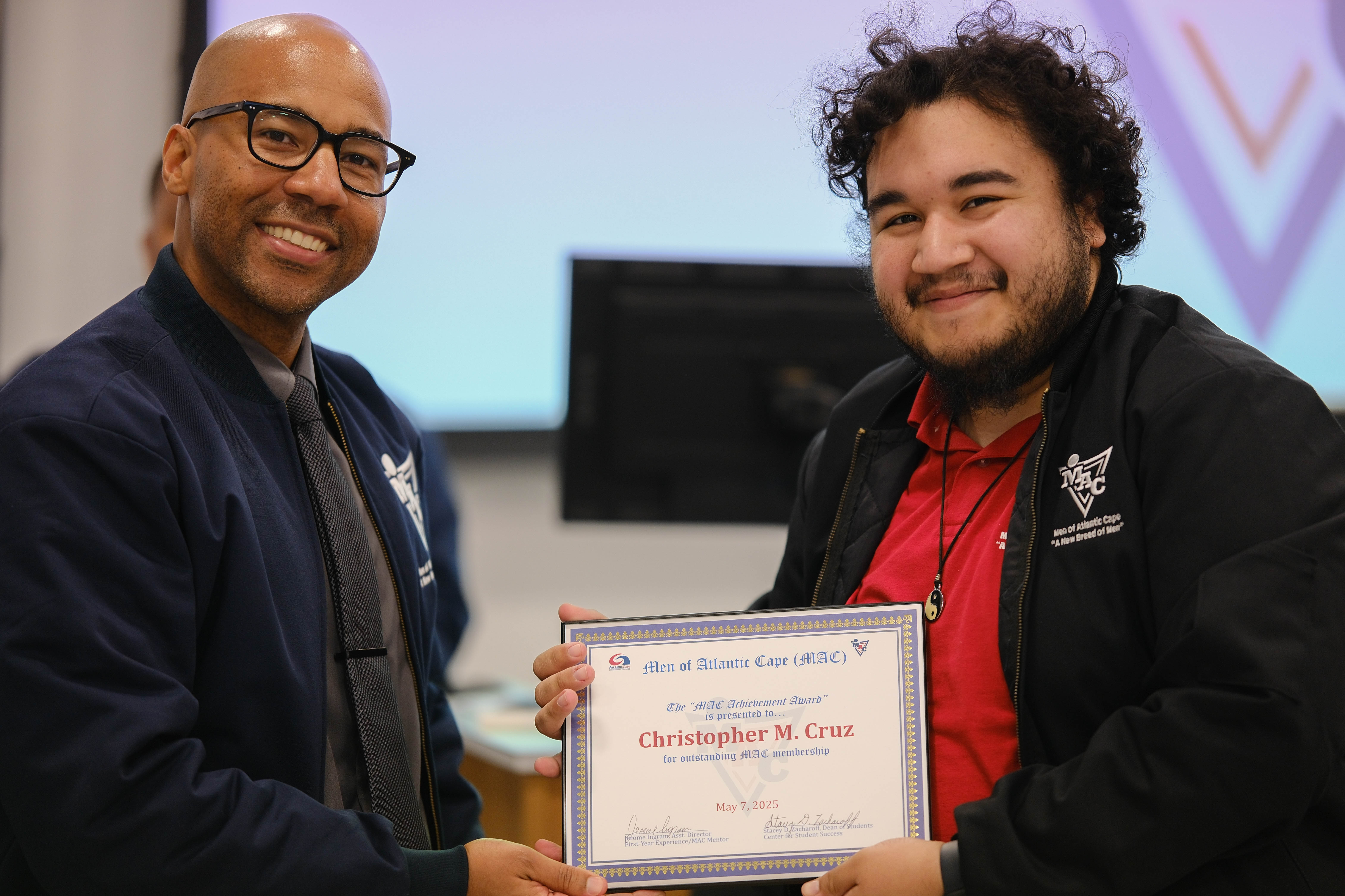 Christopher Cruz receives achievement award