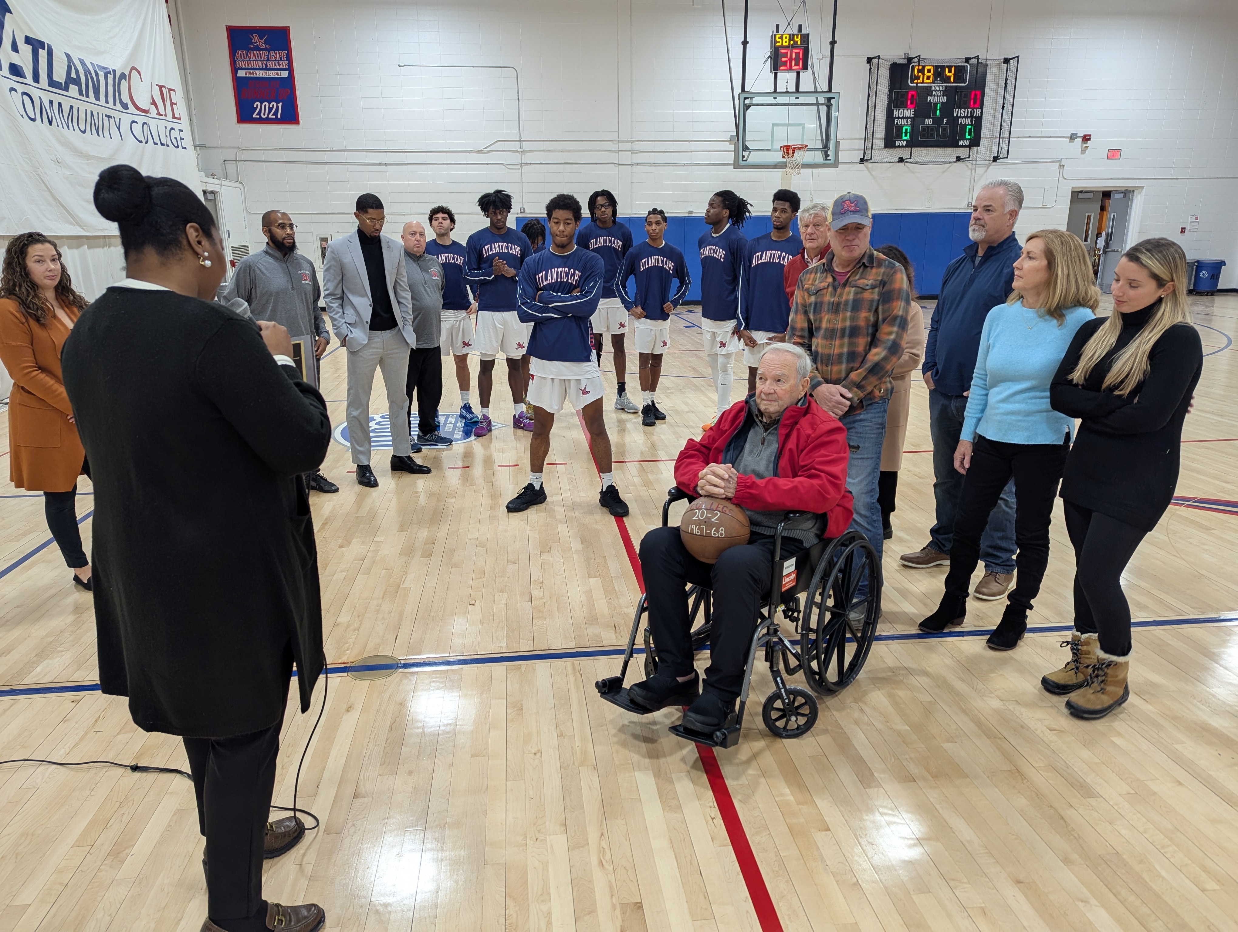 Dr. Natalie Devonish presents Robert Goudie with Athletics Recognition of Excellence Award