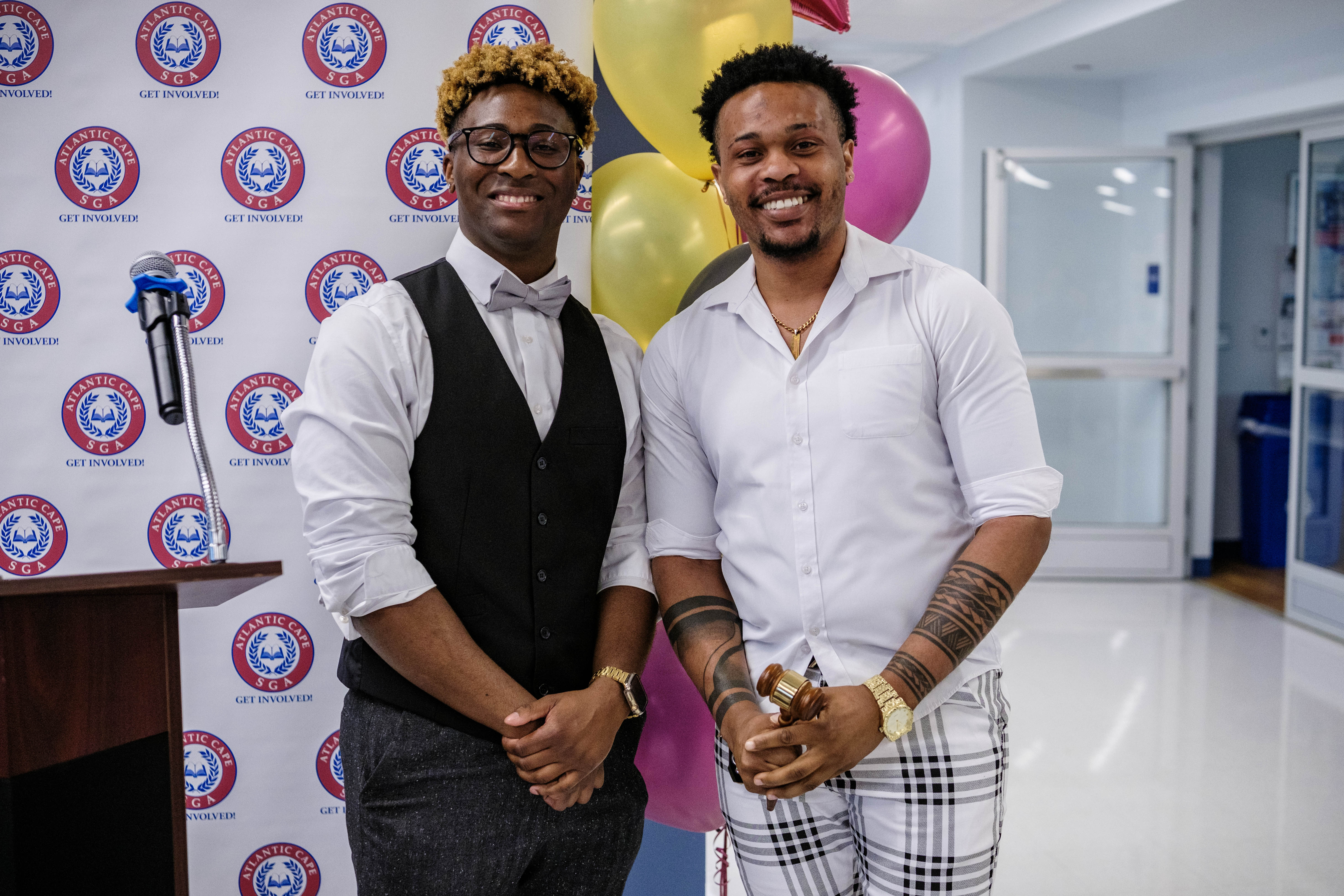 Outgoing SGA President Juwan Torres and incoming president Clive Morgan